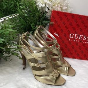 Strappy Guess heels. Gold leather.